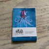 Flying squid pocket notebook with band