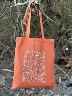 Spider faces tote bag